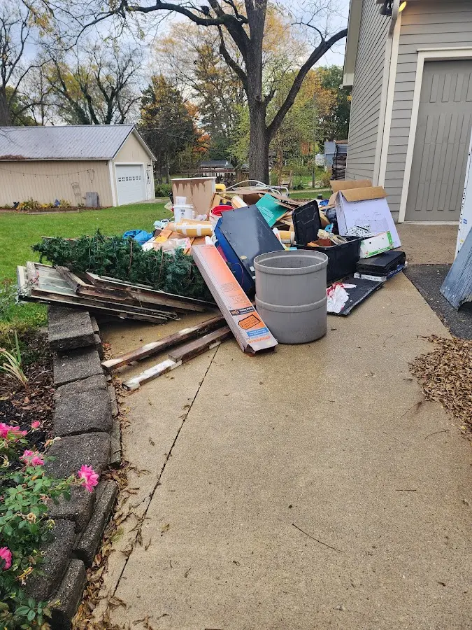 Dumpster being loaded with debris for 30 Yard Dumpster Rental in Weatherford